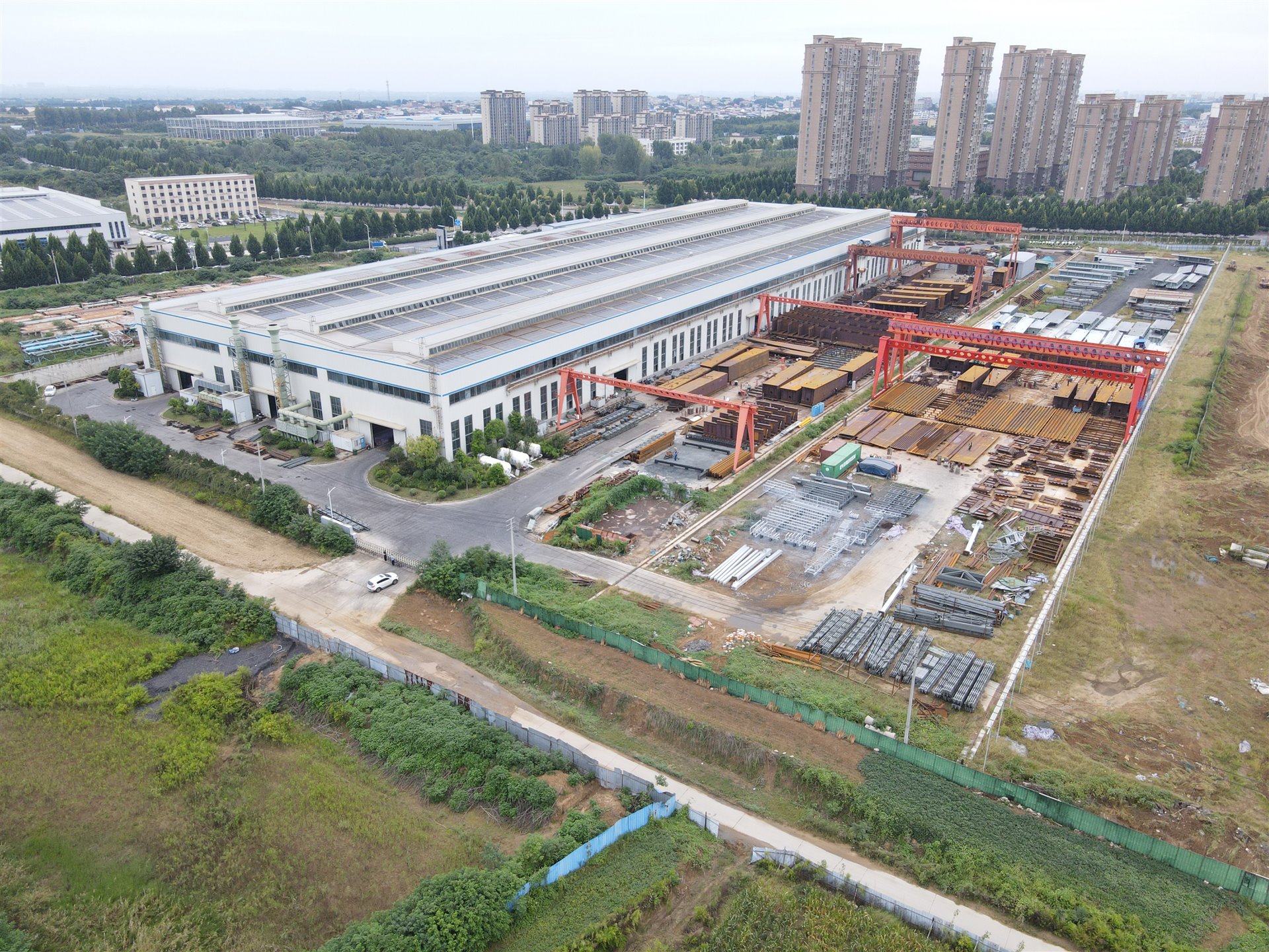 Aerial view of the HFCG Building Tech steel fabrication workshop, material yard and production facilities