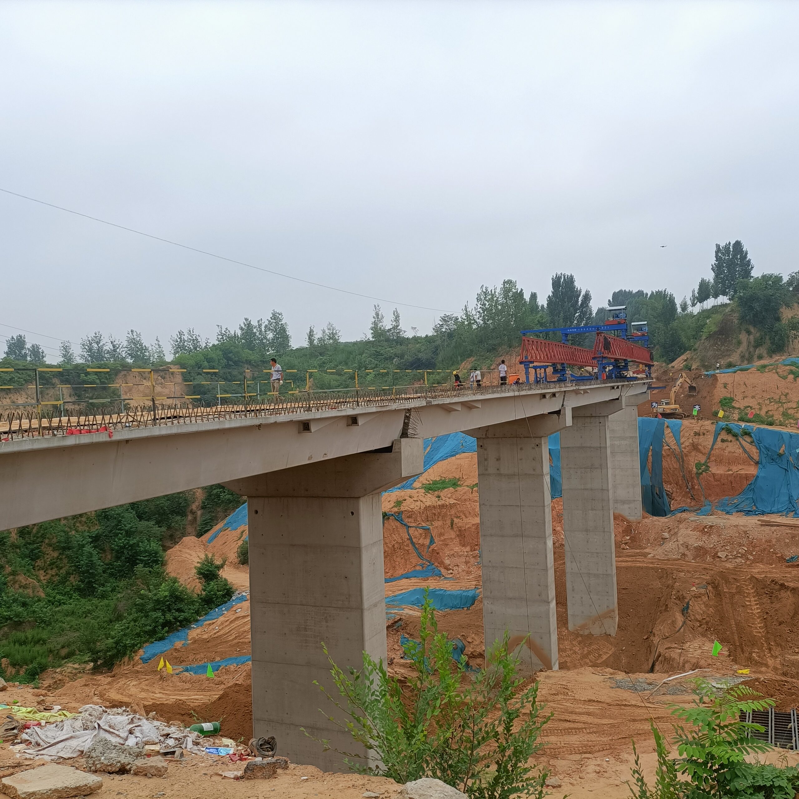 Local road and bridge reconstruction near Huanglonggang