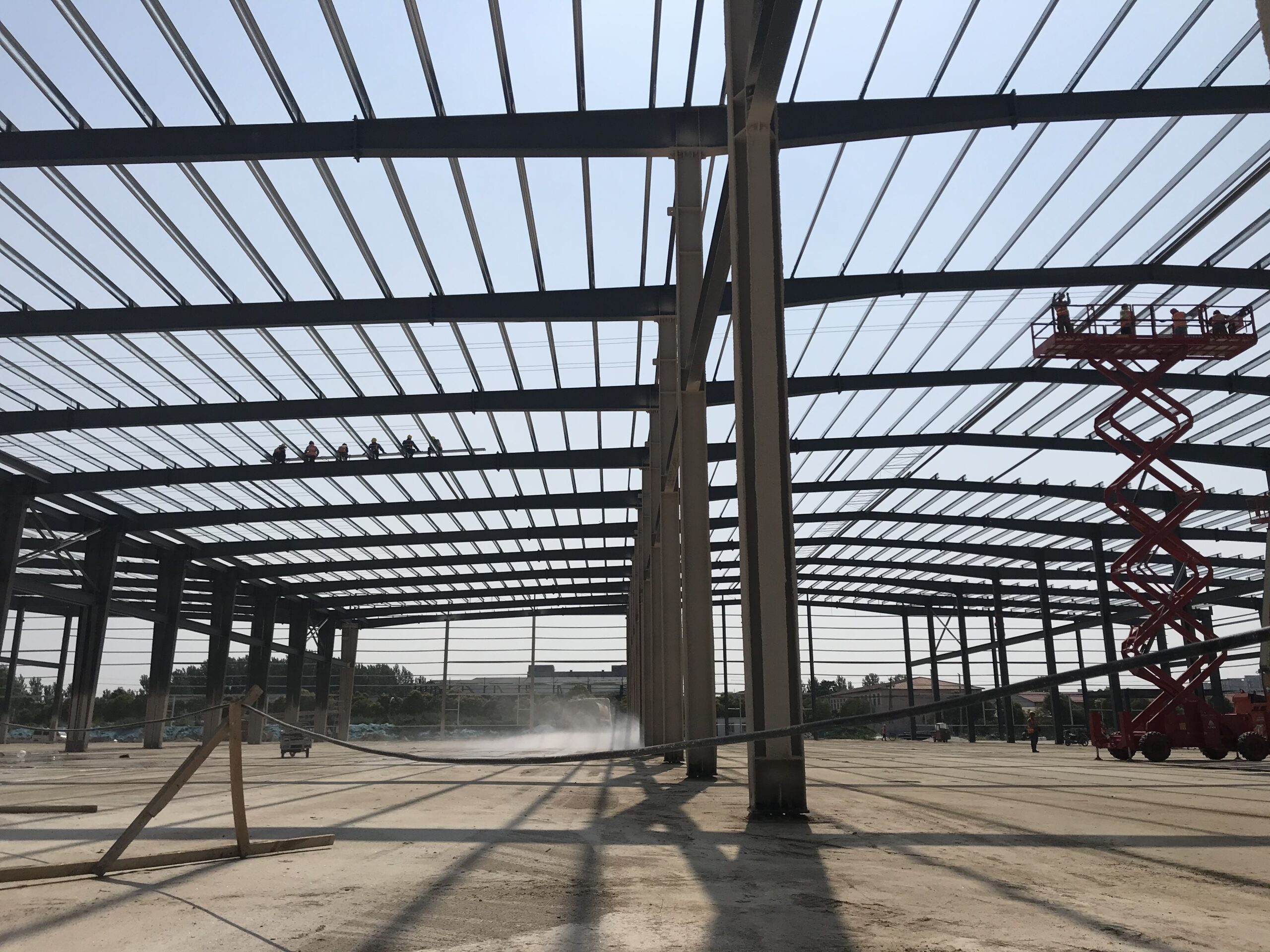 Steel workshop frame nearing enclosure